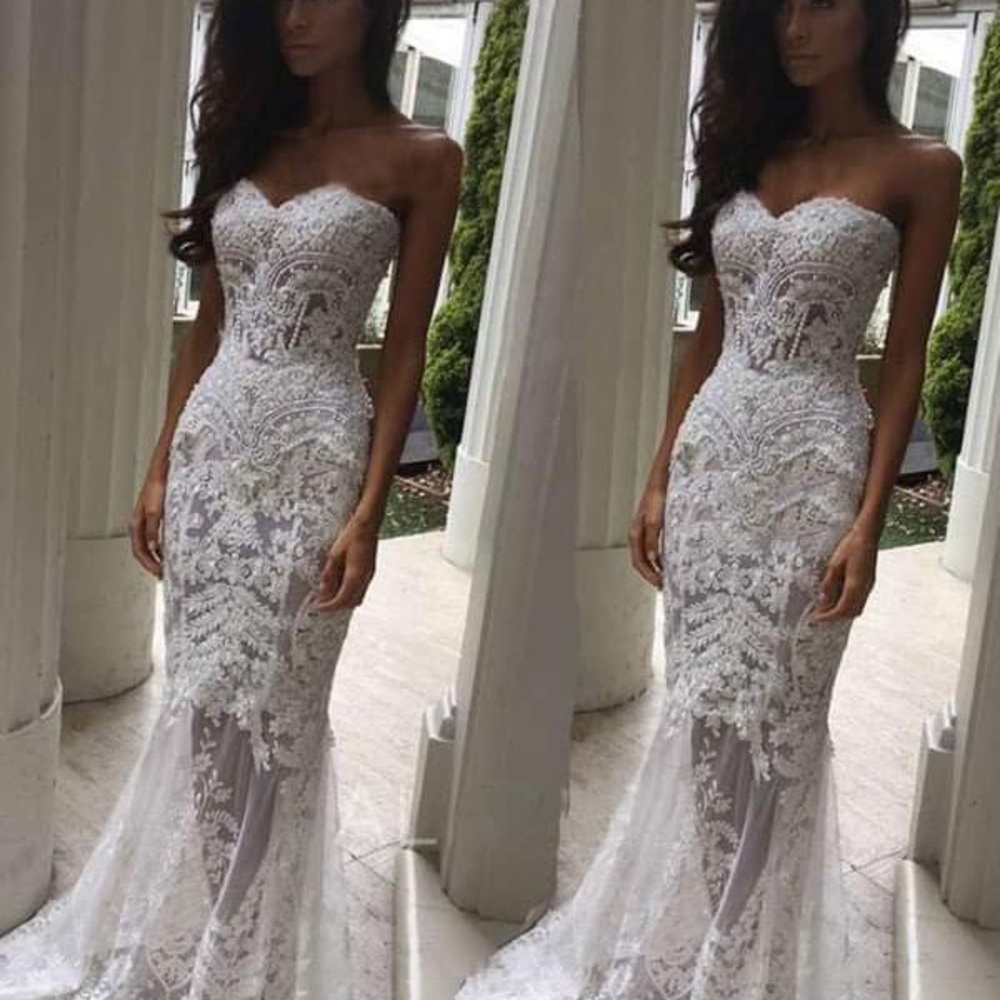 Wedding dress, never worn. To small for me